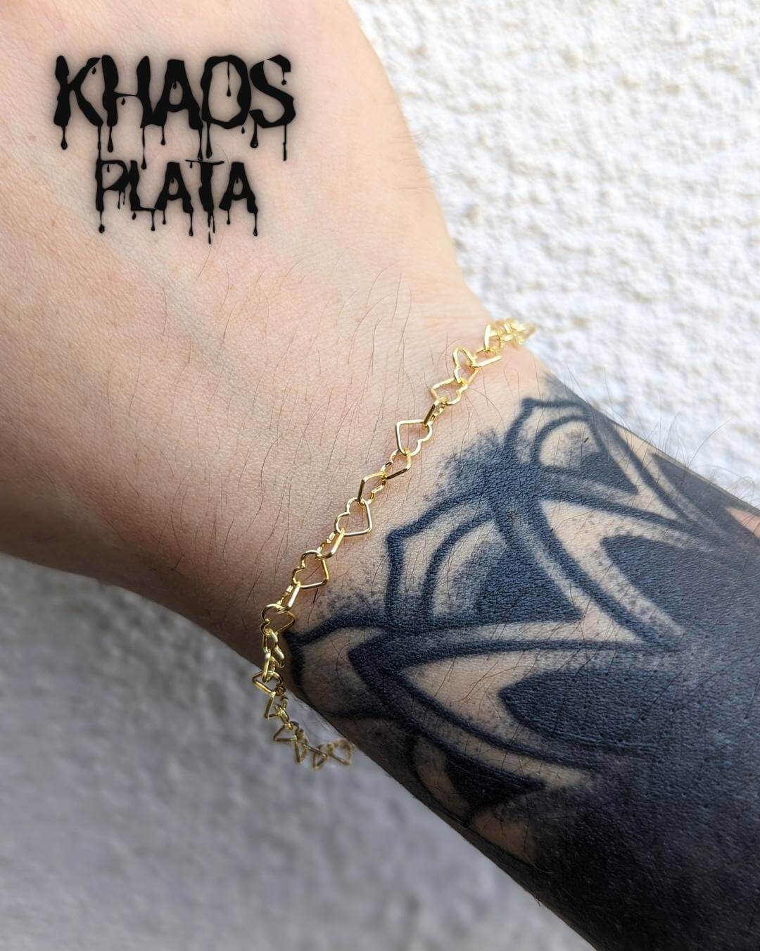 Pulsera corazones acabada en oro 18 k